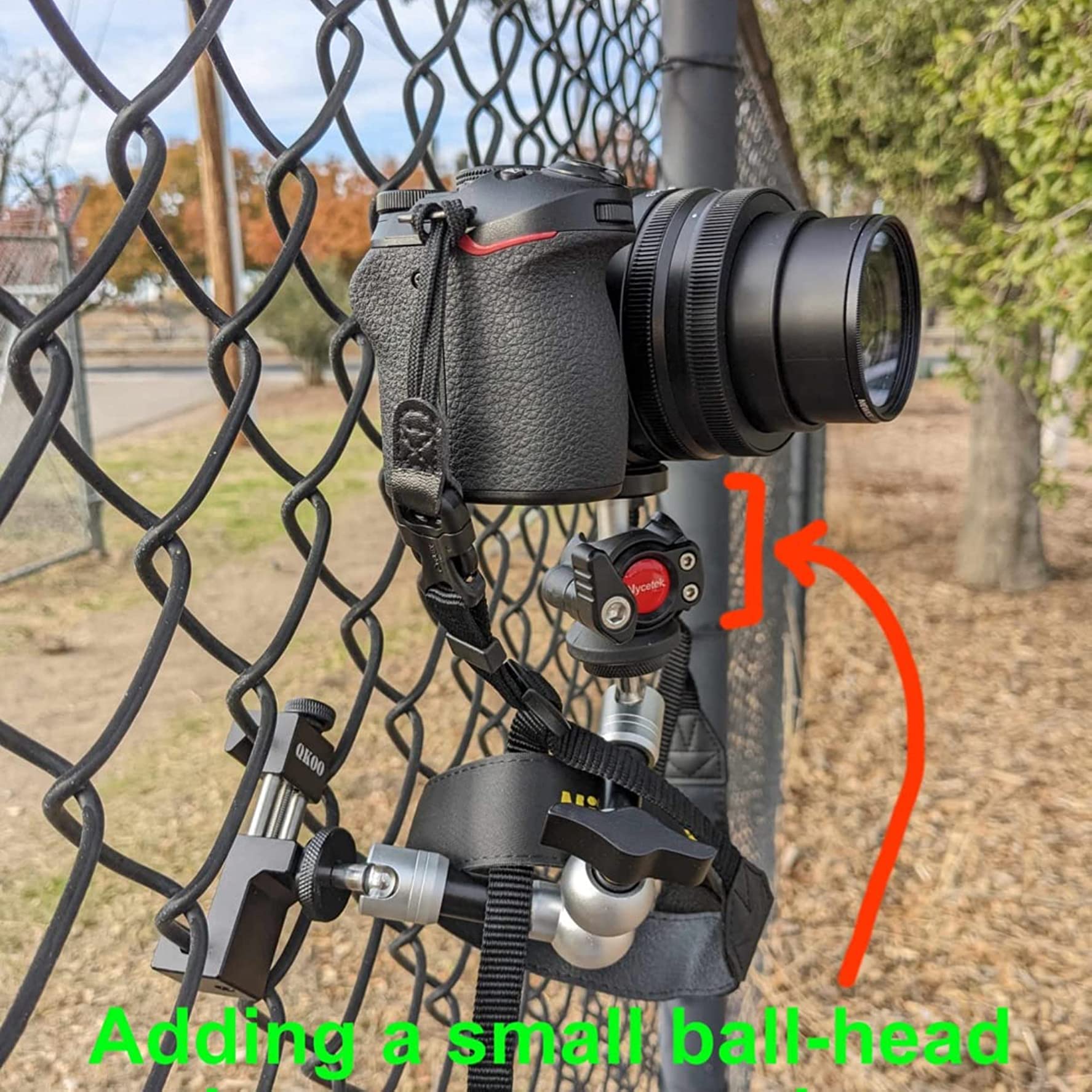 Holds securely even a small mirrorless camera. But didn't work on larger-mesh chain-link fences.